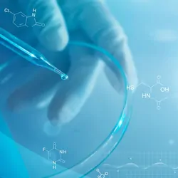 Science and medicine, scientist analyzing and dropping a sample into a glassware