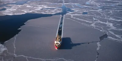 Ship saling through ice in the arctic