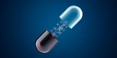 Computer render of a capsul pill, opened with DNA and particles in it, on a blue background