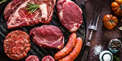 Various raw cuts of meat on a table