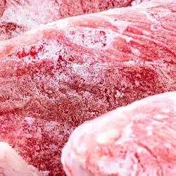 Raw frozen meat. raw pork chops