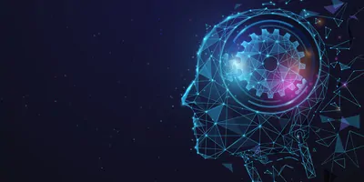 Abstract image of human in profile, with gear in brain on black background