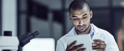 Scientist uses a tablet