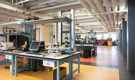 Labs in the building implement various energy-saving technologies, including solar panels, radiant cooling, and innovative HVAC designs, which are monitored and tested within the facility.