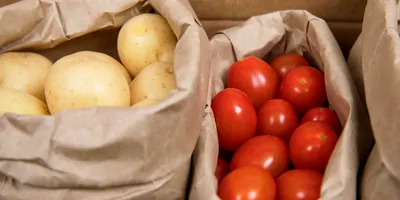 Bag of potatoes and tomatoes