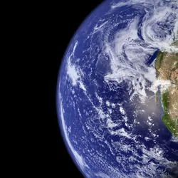 Earth and the moon in orbit in space