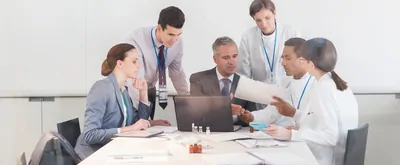 Businesspeople and scientists in a meeting