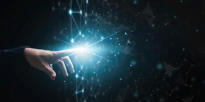 A human hand extending a finger to touch and abstract computer grid
