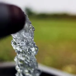 Ground water pouring from a pipe