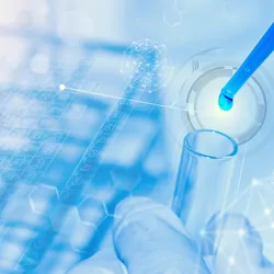 Abstract research background with pipetting, test tubes, and the periodic table exposed over each other