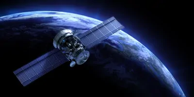 A computer image of a satellite orbiting Earth
