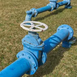 Ground water pumps in a field