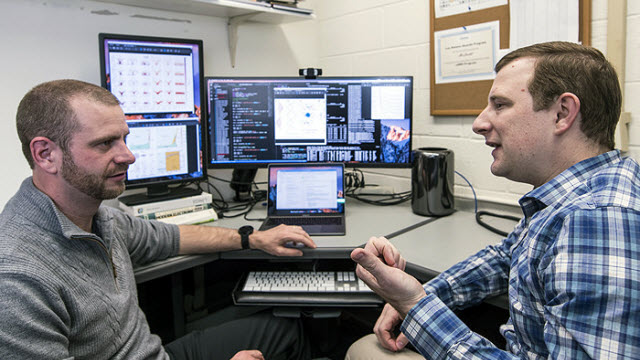 March 26, 2018 Marc Janoschek, left, and David Fobes discuss features of quantum materials. Marc Janoschek, left, and David Fobes discuss features of quantum materials