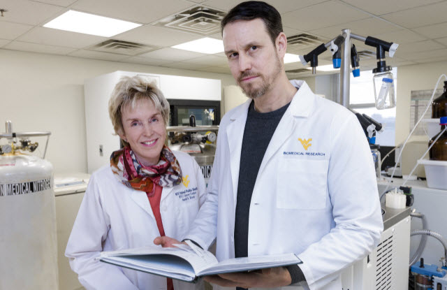 Sarah Knox, with the WVU School of Public Health, and Timothy Eubank from the WVU School of Medicine