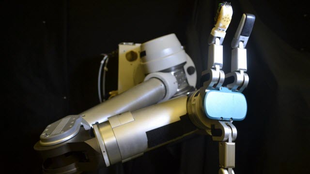 flexible sensor skin wrapped around the robot finger