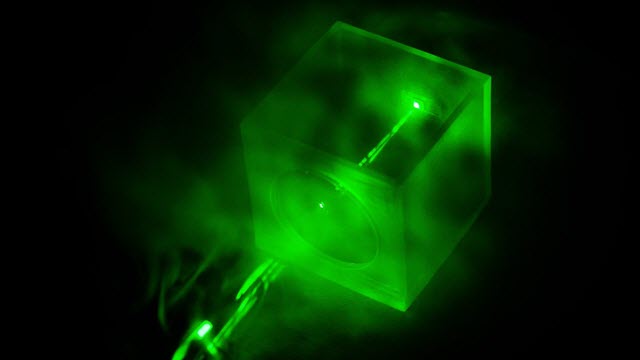 A Laser Shining on the Special Chip Designed by the NTU Researchers