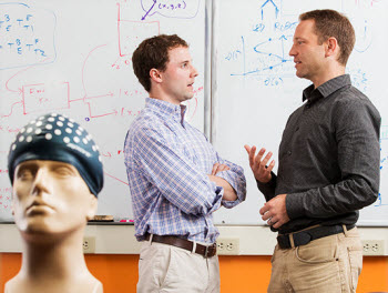 Graduate student Patrick Wellborn, left, and Professor Robert Webster