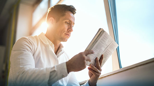 doctor reading medical journal