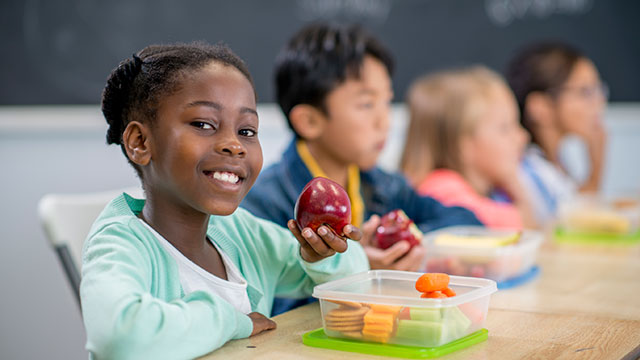 children eating lunch at school