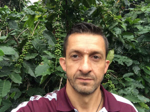 Dr. Leo Lombardini in a coffee field