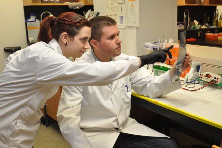 Sara Timpano and Prof. Jim Uniacke in the lab