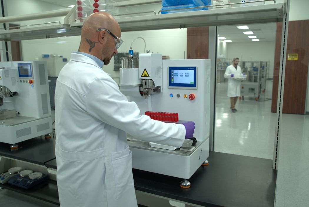 Production technicians prepare the Xylem Y1 to automatically infuse prerolls with extract, bringing precision, accuracy, and uniformity to a highly variable cannabis product. Production technicians prepare the Xylem Y1 to automatically infuse prerolls with extract, bringing precision, accuracy, and uniformity to a highly variable cannabis product.