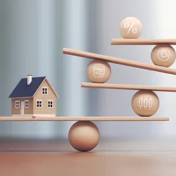 image of balanced blocks with business symbols and a small house illustrating the concept of balancing work-life with home