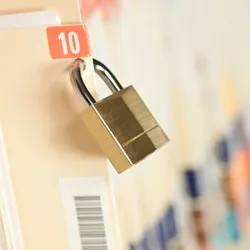 a padlock attached to a feli folder illustrating the need for a laboratory document managment system