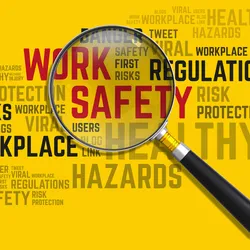 image of a word cloauf with magnifying glass highlighting safety teams i9llustrating the importance of building an effective safety training program