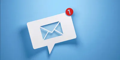 image of a speech bubble with an email icon against a blue background illutrating the importance of effective email etiquitte