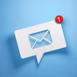 image of a speech bubble with an email icon against a blue background illutrating the importance of effective email etiquitte