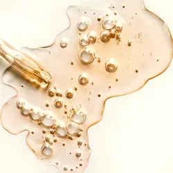 dropper with yellowish colloid gel illustrating the concept of zeta potential and particle size for colloid analysis