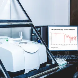 lab instrument with IR Spetroscopy graph on a computer monitor illustrating the importance of FTIR and Raman spectroscopy in laboratory analysis