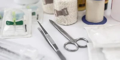 Medical tools and supplies on a white surface, symbolizing advancements in materials science, including a self-healing hydrogel that mimics human skin.