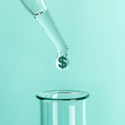 pipette dripping liquid into a test tube, the liquid shows a doallr sign it it symboloc if the comcept of the cost of lab safety