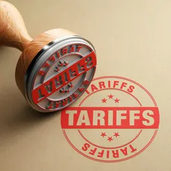 A red circular tariffs stamp on butcher paper signalling the importance of lab manager tariff strategies