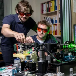 Researchers using optofluidic and Raman technology to detect nanoplastics in body fluid samples.