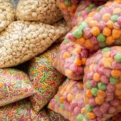 Clear bags of ultraprocessed snack foods like cheese balls
