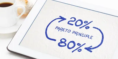 image of a drawing showing 80% leading to 20% on a tablet illustrating Pareto's rule or the 80/20 rule