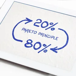 image of a drawing showing 80% leading to 20% on a tablet illustrating Pareto's rule or the 80/20 rule