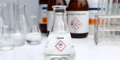 Beaker of cyanide representing the dangers of potassium cyanide.