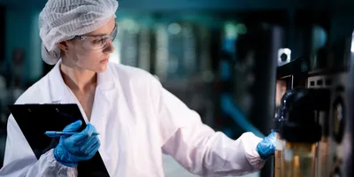 A female inspector symbolic of usp and ep standards.