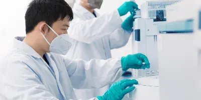 Scientist performing liquid chromatography, symbolic of new advances in ELSD.
