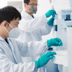 Scientist performing liquid chromatography, symbolic of new advances in ELSD.