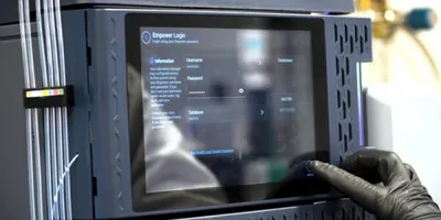 Close up of researcher using the HPLC software