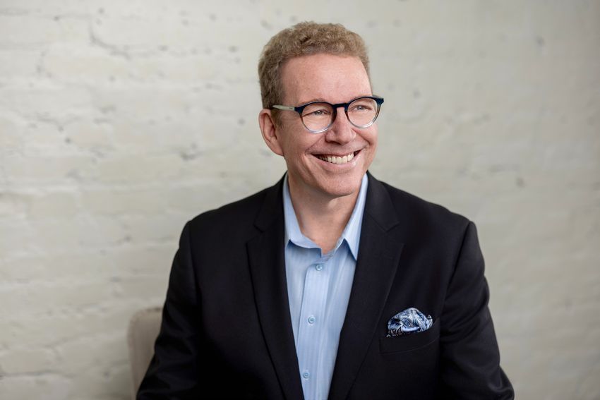 Headshot of Adam Christing