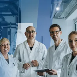 A group of smiling scientists