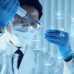 Scientist pipettes into a tube with charts and data holograms floating around him, representing artificial intelligence being used in life science research