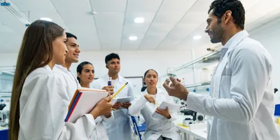 Lab team discussing safety procedures during onboarding