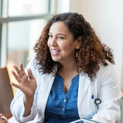 Two lab leaders engaged in deep listening during a conversation